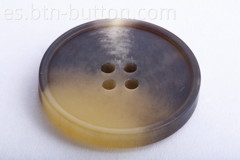 Four-eye button resin button